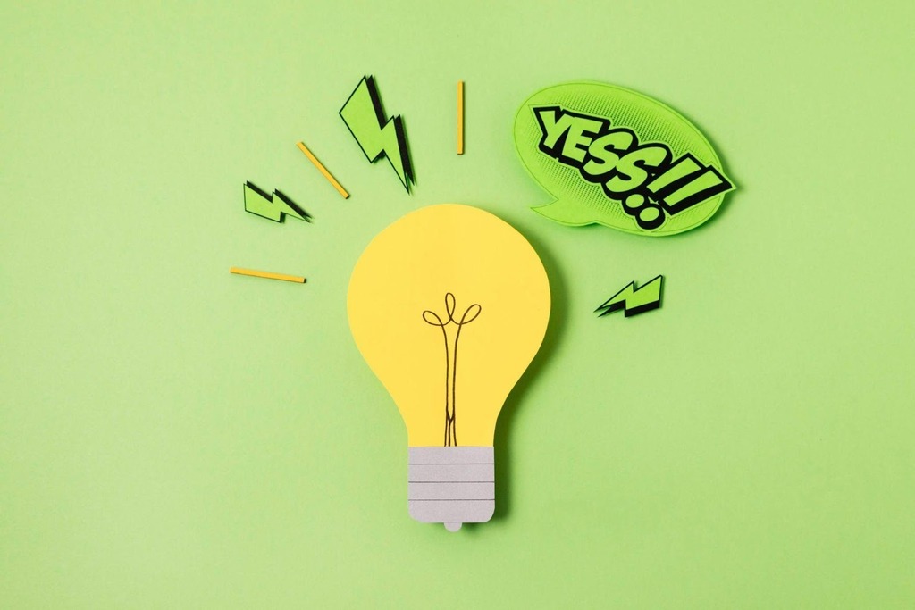 Ilustraão de uma lâpada amarela representando uma ideia.